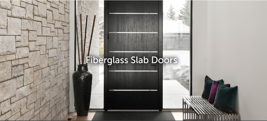 Modern dark wood entryway door with silver accents
