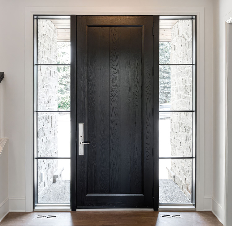 Dark fiberglass entry door with sidelites
